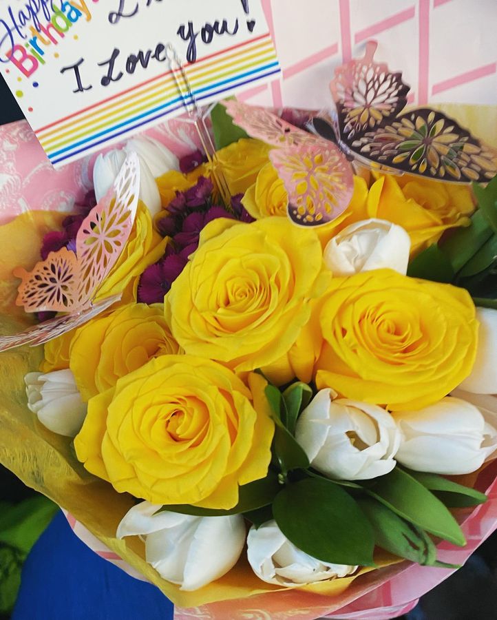 Yellow roses and white tulips